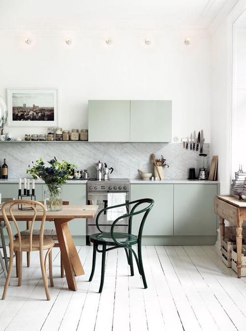 Кухня в скандинавском стиле фисташкового цвета.